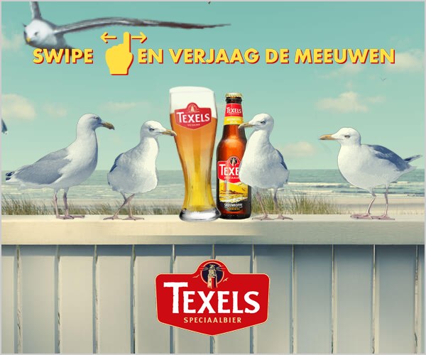 Meeuwen op het hek rond een glas Skuumkoppe