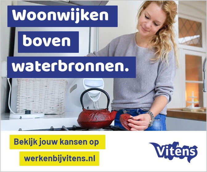 Woonwijken boven waterbronnen. boven een vrouw in de keuken